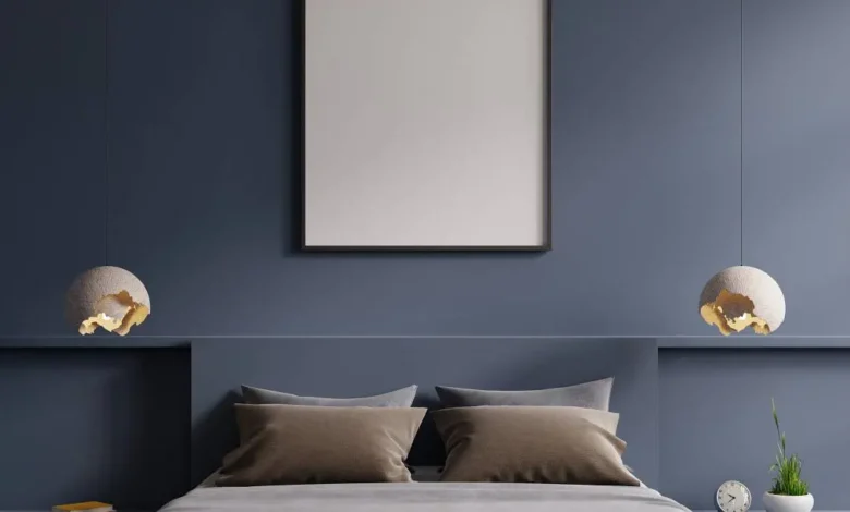 poster mockup with vertical frame empty dark blue wall bedroom interior wp jpg